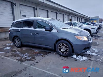 Czwarte zdjęcie samochodu z boku: 2012 HONDA ODYSSEY EXL VIN:5FNRL5H64CB066299 - miniatura