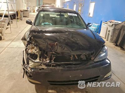 Piąte zdjęcie samochodu w środku: 2002 TOYOTA CAMRY LE VIN:4T1BF30K52U015787 - miniatura