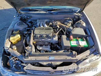 Zdjęcie 11 z 12 samochodu: 1996 TOYOTA CAMRY LE VIN:4T1EF12K5TU125643 - miniatura