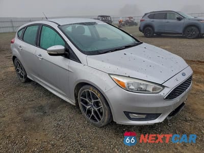 Czwarte zdjęcie samochodu z boku: 2016 FORD FOCUS SE VIN:1FADP3K24GL258680 - miniatura