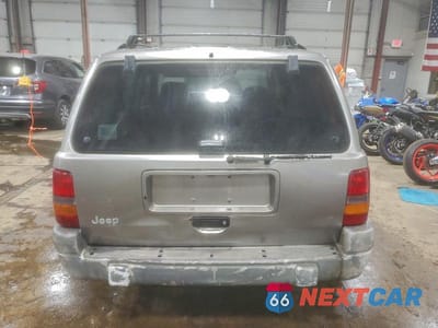 Zdjęcie 6 z 12 samochodu: 1998 JEEP GRAND CHEROKEE LAREDO VIN:1J4GZ58S1WC237685 - miniatura