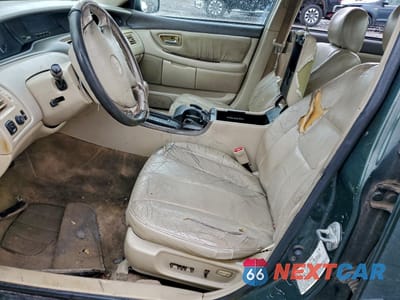 Zdjęcie 7 z 14 samochodu: 2000 TOYOTA AVALON XL VIN:4T1BF28B5YU030751 - miniatura