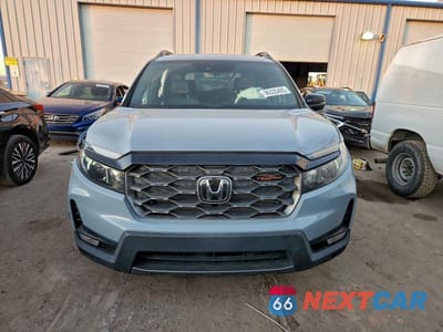 Piąte zdjęcie samochodu w środku: 2023 HONDA PASSPORT TRAIL SPORT VIN:5FNYF8H64PB015606 - miniatura