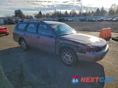 Czwarte zdjęcie samochodu z boku: 1996 TOYOTA CAMRY LE VIN:4T1EF12K5TU125643 - miniatura