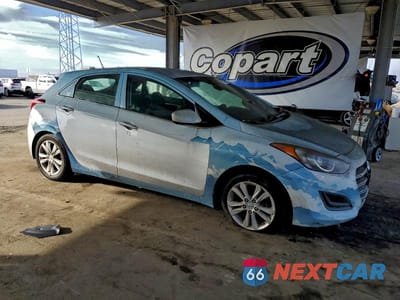Czwarte zdjęcie samochodu z boku: 2016 HYUNDAI ELANTRA GT VIN:KMHD35LH2GU305246 - miniatura