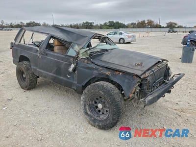 Czwarte zdjęcie samochodu z boku: 1992 JEEP CHEROKEE VIN:1J4FJ58S3NL102998 - miniatura