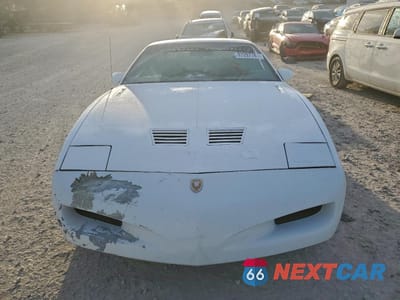 Piąte zdjęcie samochodu w środku: 1991 PONTIAC FIREBIRD TRANS AM VIN:1G2FW2384ML211992 - miniatura