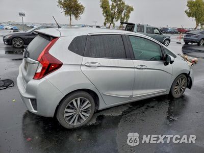 Trzecie zdjęcie samochodu z tyłu: 2015 HONDA FIT EX VIN:3HGGK5H8XFM757642 - miniatura