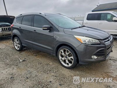 Czwarte zdjęcie samochodu z boku: 2016 FORD ESCAPE TITANIUM VIN:1FMCU0J90GUC85876 - miniatura