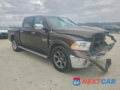 Czwarte zdjęcie samochodu z boku: 2015 RAM 1500 LARAMIE VIN:1C6RR6NT8FS614026 - miniatura
