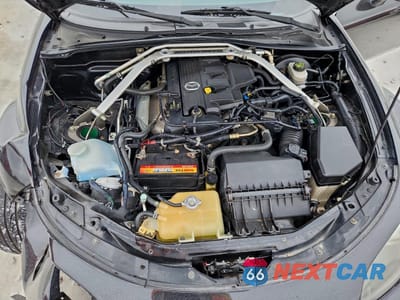 Zdjęcie 11 z 12 samochodu: 2006 MAZDA MX-5 MIATA VIN:JM1NC25F760110686 - miniatura