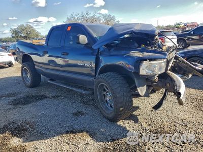 Czwarte zdjęcie samochodu z boku: 2002 DODGE RAM 1500 VIN:1D7HU18N72S575559 - miniatura