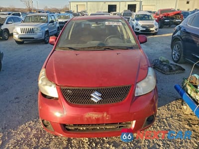 Piąte zdjęcie samochodu w środku: 2012 SUZUKI SX4 LE VIN:JS2YC5A36C6300259 - miniatura