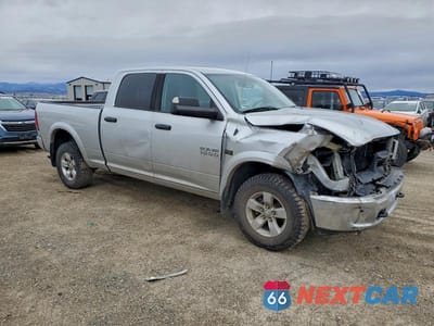 Czwarte zdjęcie samochodu z boku: 2014 RAM 1500 SLT VIN:1C6RR7TT9ES434643 - miniatura