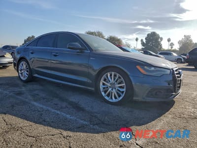 Czwarte zdjęcie samochodu z boku: 2014 AUDI A6 PRESTIGE VIN:WAUHGAFC0EN074371 - miniatura