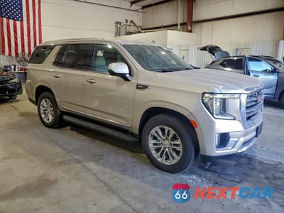 Czwarte zdjęcie samochodu z boku: 2022 GMC YUKON SLT VIN:1GKS1BKD3NR312080 - miniatura