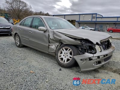 Czwarte zdjęcie samochodu z boku: 2003 MERCEDES-BENZ E 320 VIN:WDBUF65J33X100656 - miniatura