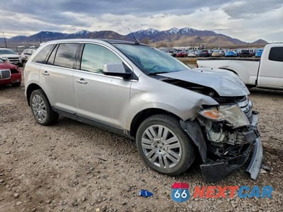 Czwarte zdjęcie samochodu z boku: 2010 FORD EDGE LIMITED VIN:2FMDK4KC5ABA04602 - miniatura