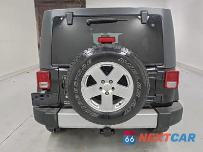 Zdjęcie 6 z 13 samochodu: 2012 JEEP WRANGLER UNLIMITED SAHARA VIN:1C4HJWEG7CL113939 - miniatura