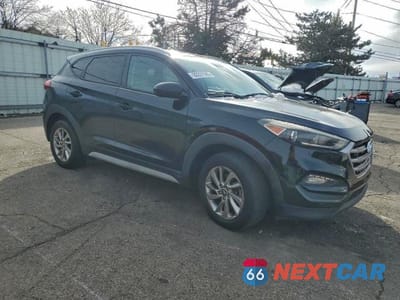 Czwarte zdjęcie samochodu z boku: 2017 HYUNDAI TUCSON LIMITED VIN:KM8J33A43HU433939 - miniatura