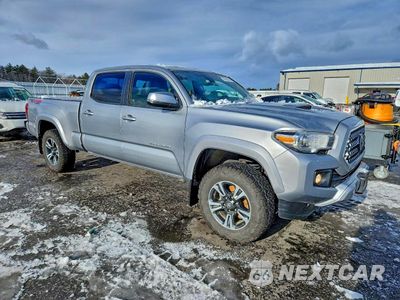 Czwarte zdjęcie samochodu z boku: 2019 TOYOTA TACOMA DOUBLE CAB VIN:3TMDZ5BN0KM067730 - miniatura