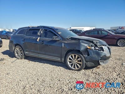 Czwarte zdjęcie samochodu z boku: 2012 LINCOLN MKT VIN:2LMHJ5ATXCBL52771 - miniatura
