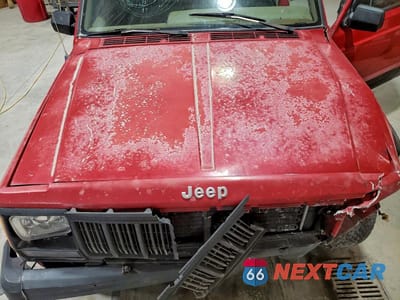 Zdjęcie 12 z 13 samochodu: 1995 JEEP CHEROKEE SPORT VIN:1J4FT67S2SL576986 - miniatura