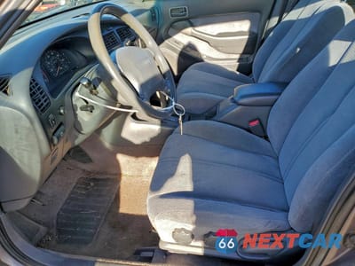 Zdjęcie 7 z 12 samochodu: 1996 TOYOTA CAMRY LE VIN:4T1EF12K5TU125643 - miniatura