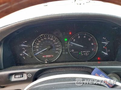 Zdjęcie 9 z 13 samochodu: 2004 LEXUS LX 470 VIN:JTJHT00W143543972 - miniatura