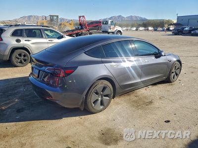 Trzecie zdjęcie samochodu z tyłu: 2023 TESLA MODEL 3 VIN:5YJ3E1EB6PF655905 - miniatura