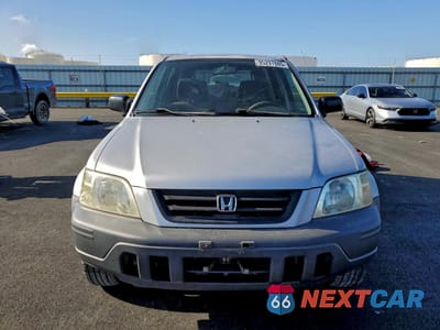 Piąte zdjęcie samochodu w środku: 1999 HONDA CR-V LX VIN:JHLRD1847XC063777 - miniatura