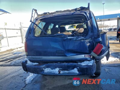 Zdjęcie 6 z 15 samochodu: 1999 GMC JIMMY VIN:1GKDT13WXX2558102 - miniatura