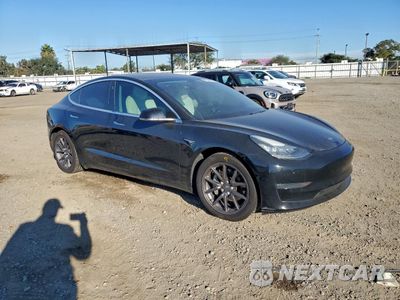 Czwarte zdjęcie samochodu z boku: 2020 TESLA MODEL 3 VIN:5YJ3E1EB1LF719987 - miniatura