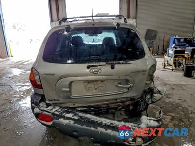 Zdjęcie 6 z 12 samochodu: 2004 HYUNDAI SANTA FE GLS VIN:KM8SC13D44U853676 - miniatura