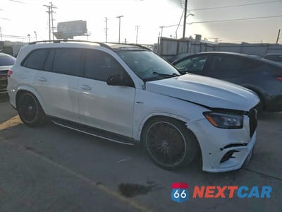 Czwarte zdjęcie samochodu z boku: 2021 MERCEDES-BENZ GLS 63 AMG 4MATIC VIN:4JGFF8KE3MA402977 - miniatura