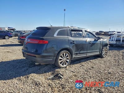 Trzecie zdjęcie samochodu z tyłu: 2012 LINCOLN MKT VIN:2LMHJ5ATXCBL52771 - miniatura