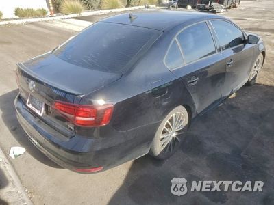 Trzecie zdjęcie samochodu z tyłu: 2016 VOLKSWAGEN JETTA SPORT VIN:3VWD17AJ7GM384779 - miniatura