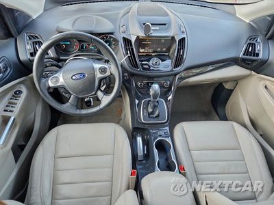 Zdjęcie 8 z 13 samochodu: 2014 FORD ESCAPE TITANIUM VIN:1FMCU0J93EUB68810 - miniatura