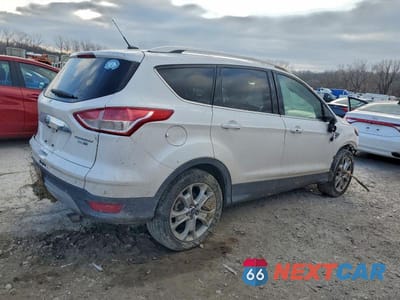 Trzecie zdjęcie samochodu z tyłu: 2016 FORD ESCAPE VIN:1FMCU9J94GUA21256 - miniatura