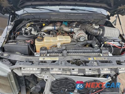 Zdjęcie 12 z 15 samochodu: 2000 FORD EXCURSION LIMITED VIN:1FMNU43S7YEB63026 - miniatura