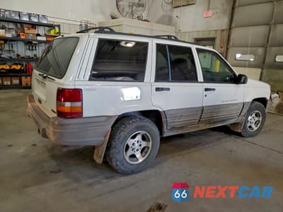 Trzecie zdjęcie samochodu z tyłu: 1996 JEEP GRAND CHEROKEE LAREDO VIN:1J4GZ58S7TC321098 - miniatura