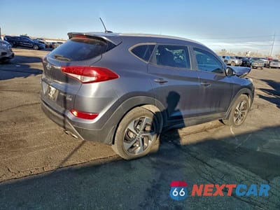 Trzecie zdjęcie samochodu z tyłu: 2016 HYUNDAI TUCSON VIN:KM8J3CA20GU157863 - miniatura
