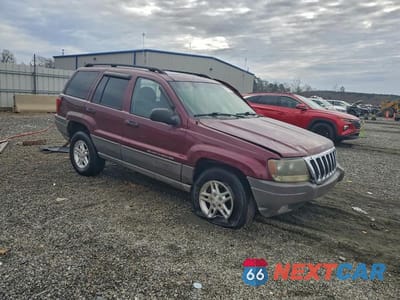 Czwarte zdjęcie samochodu z boku: 2003 JEEP GRAND CHEROKEE LAREDO VIN:1J8GW48S93C556717 - miniatura