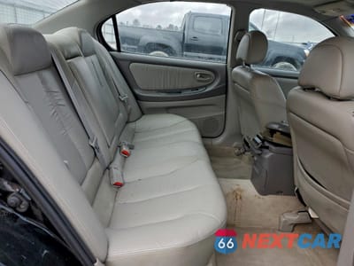Zdjęcie 10 z 14 samochodu: 2000 NISSAN MAXIMA GLE VIN:JN1CA31A6YT028448 - miniatura