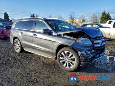 Czwarte zdjęcie samochodu z boku: 2015 MERCEDES-BENZ GL 450 4MATIC VIN:4JGDF6EE2FA506516 - miniatura