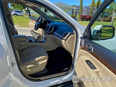 Piąte zdjęcie samochodu w środku: 2016 JEEP GRAND CHEROKEE LAREDO VIN:1C4RJEAGXGC451488 - miniatura