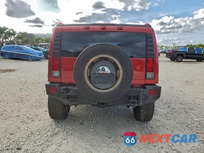 Zdjęcie 6 z 15 samochodu: 2005 HUMMER H2 VIN:5GRGN23U95H122700 - miniatura