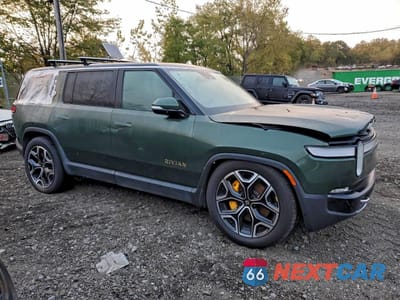 Czwarte zdjęcie samochodu z boku: 2023 RIVIAN R1S LAUNCH EDITION VIN:7PDSGABLXPN020988 - miniatura