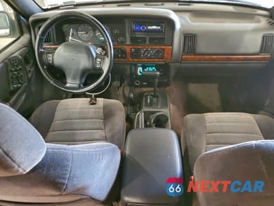 Zdjęcie 8 z 14 samochodu: 1996 JEEP GRAND CHEROKEE LAREDO VIN:1J4GZ58S7TC321098 - miniatura