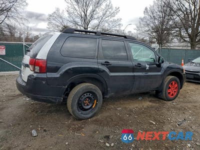 Trzecie zdjęcie samochodu z tyłu: 2011 MITSUBISHI ENDEAVOR LS VIN:4A4JN2ASXBE026296 - miniatura